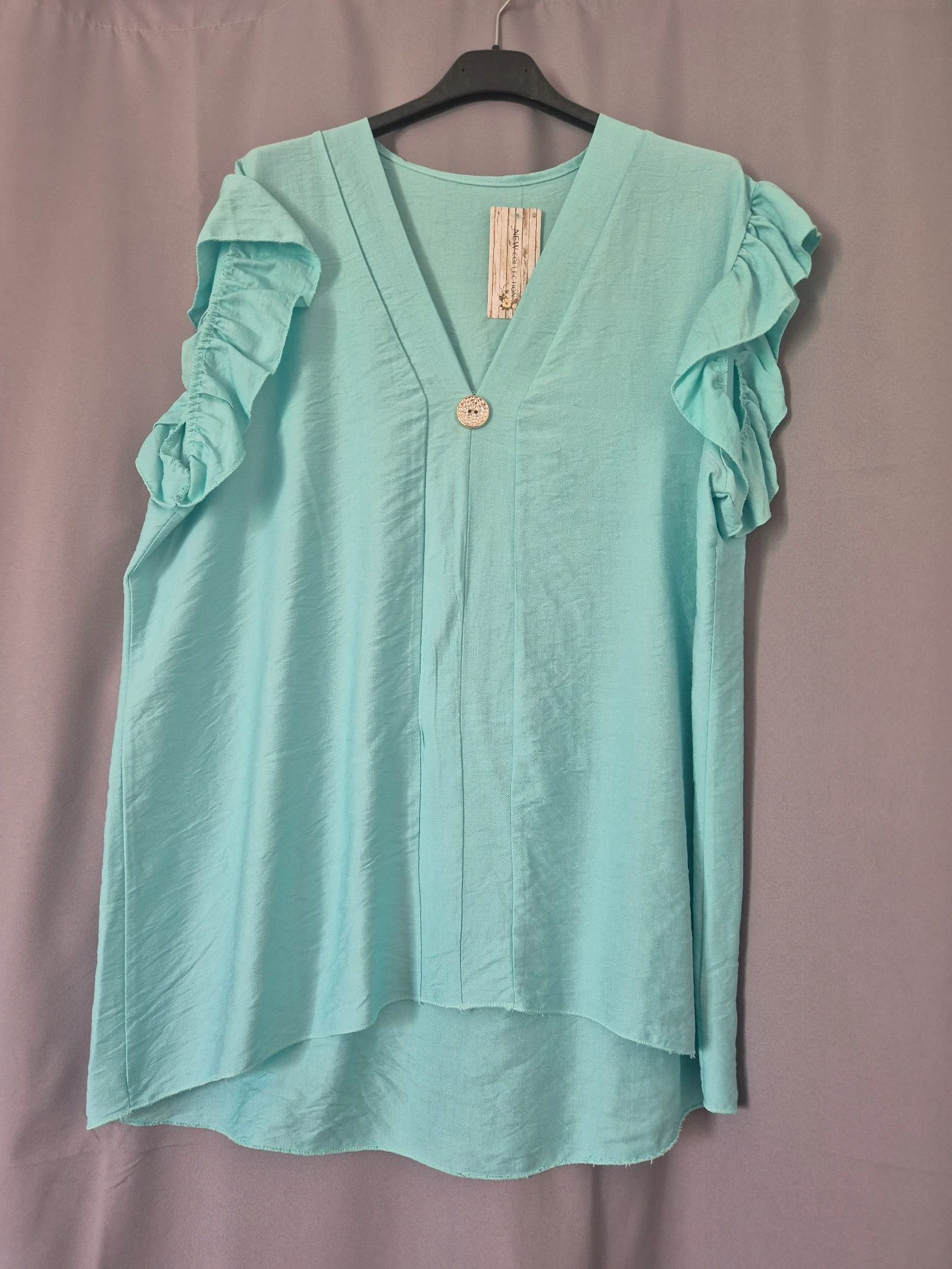 Blouse a froufrous vert eau 